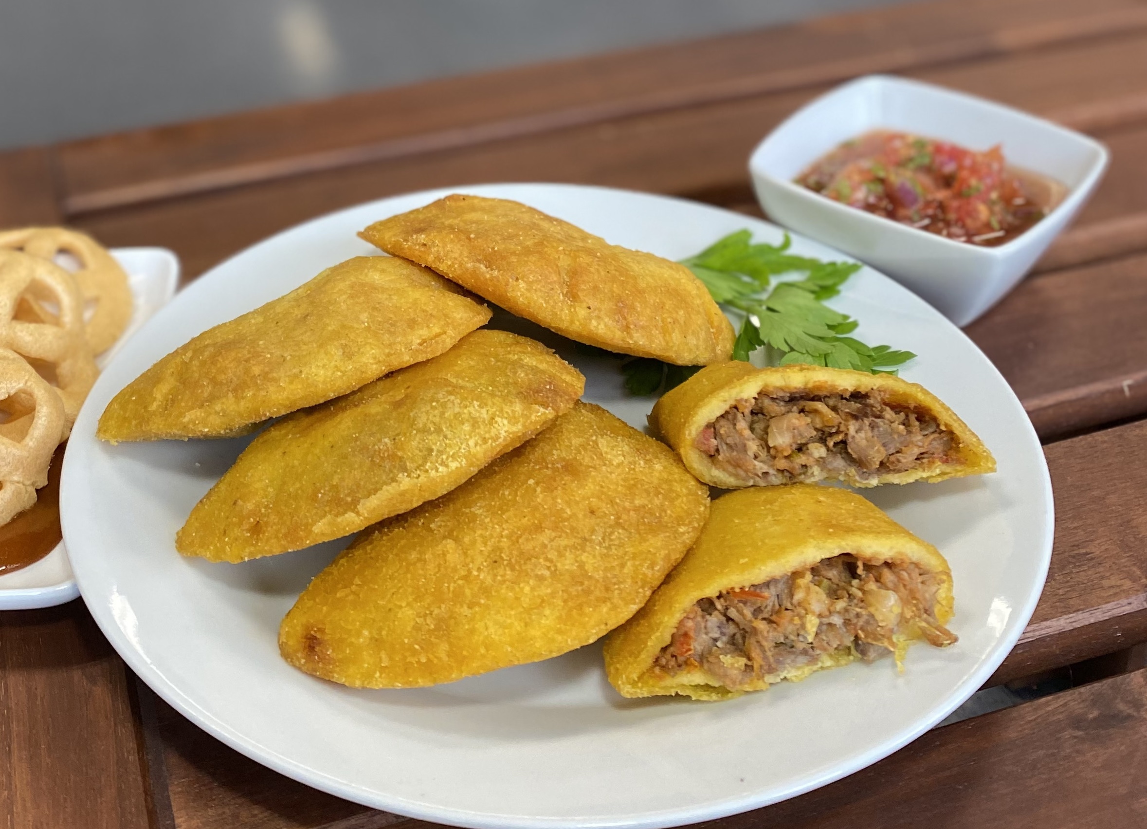 Authentic Colombian beef empanada available at Bienvenidos Latin Market in Ottawa. Made with seasoned beef for an authentic Colombian taste.